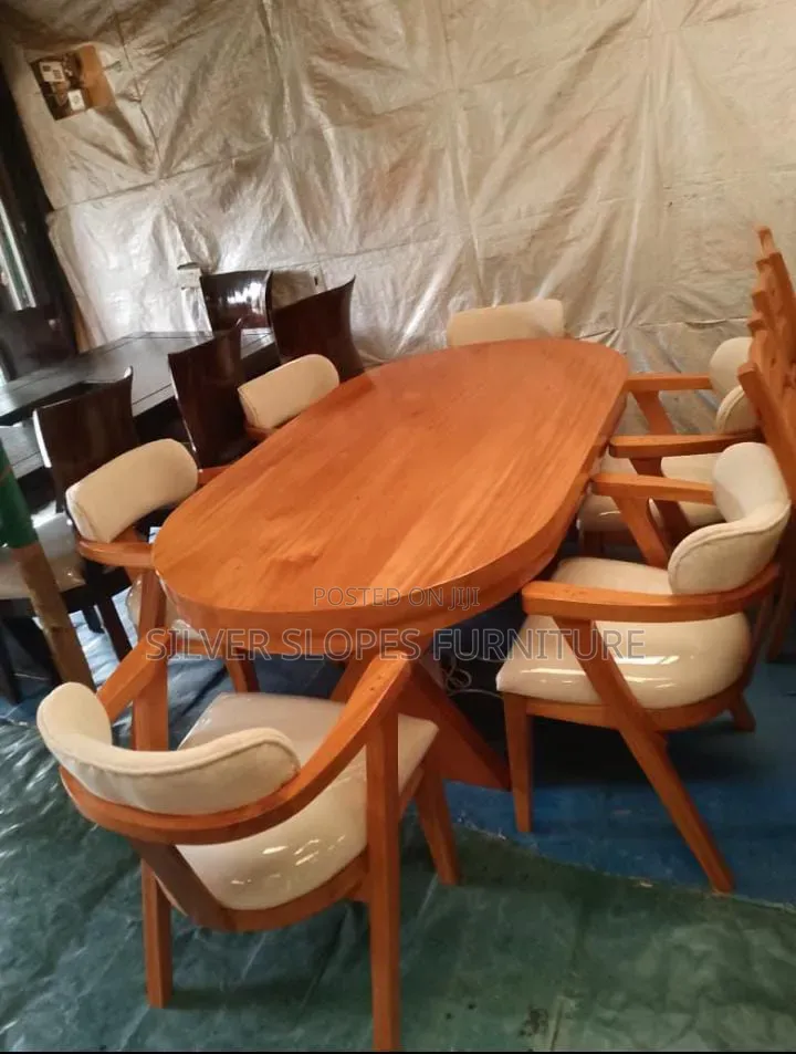 5- Hardwood (Mahogany) Dinning Table.