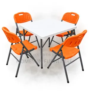 Folding Table With 4 Orange Chairs