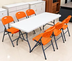Folding Table With 6 Orange Chairs