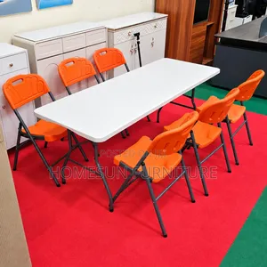Folding Table With 6 Orange Chairs