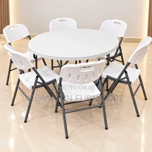 Round Folding Table With 6 White Chairs