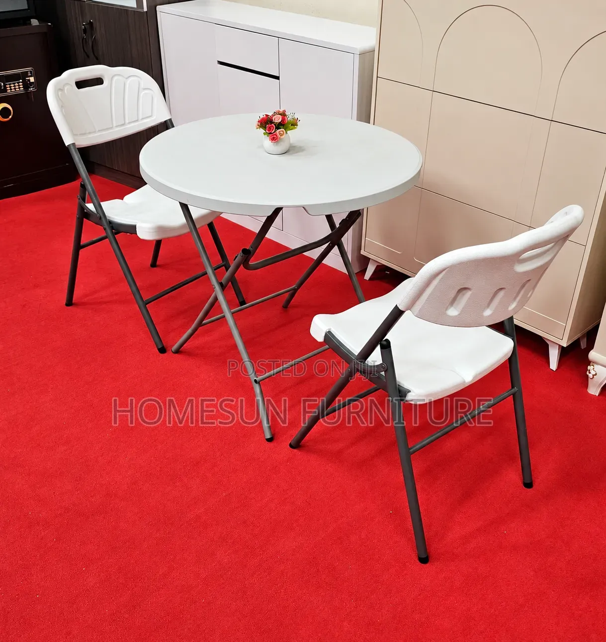 Round Folding Table With 2 White Chairs
