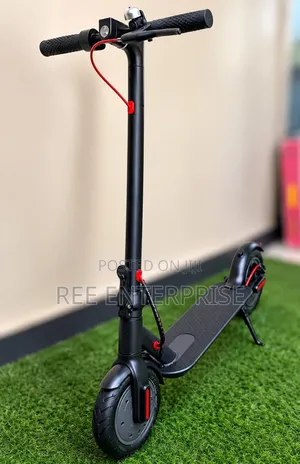  Ride in Style With This Sleek Adults Electric Scooter.