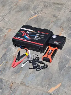 Portable Automotive Jump Starter Kit for Dead Batteries and Flat Tyres