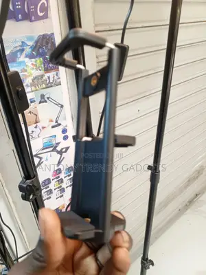 Adjustable Smartphone and Tablet Tripod Mount Adapter