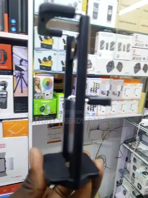 Adjustable Black Tablet and Phone Mount for Tripods and Selfie Sticks