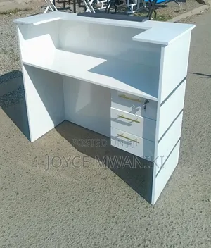 White and Black Reception Desk 