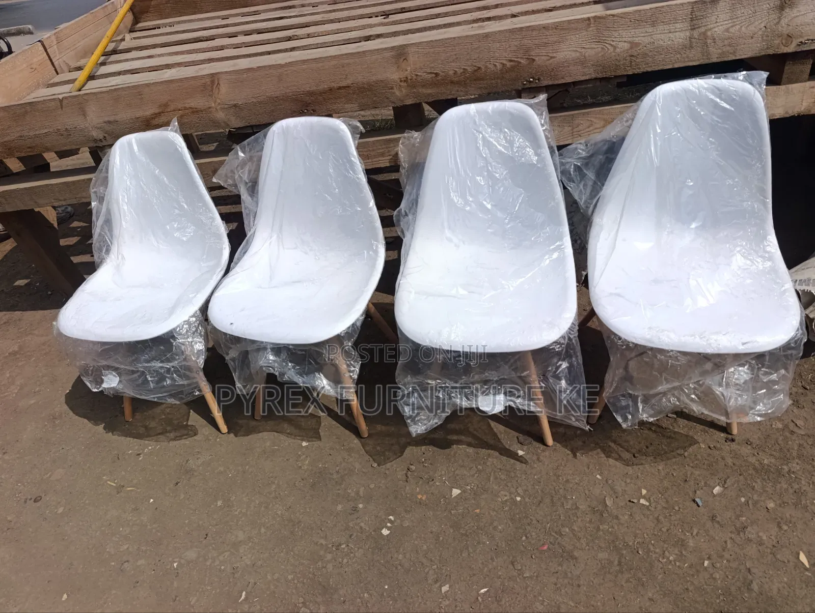 White Space Saving Eames Chairs