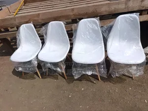 White Space Saving Eames Chairs