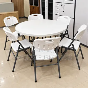 Round Folding Table With White Chairs
