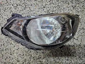 Nissan Wingload Y12 Headlight