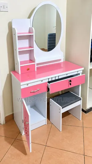 Pink and White Dressing Table With Mirror