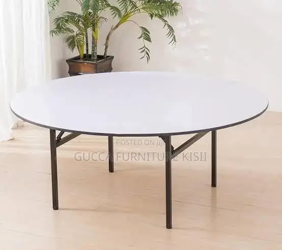 Multipurpose Round Table With Foldable Legs.