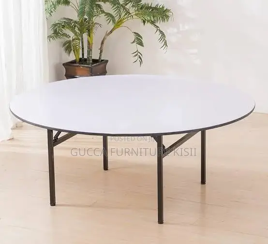Multipurpose Round Table With Foldable Legs.