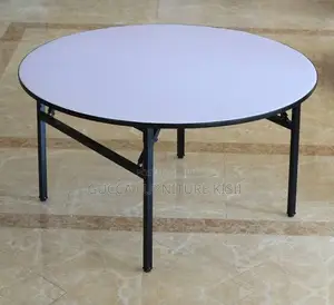 Multipurpose Round Table With Foldable Legs.