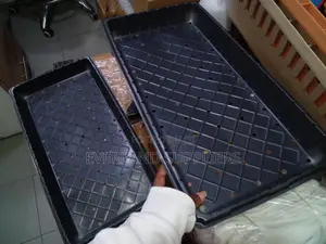Efficiently Perforated Plant Trays - With Holes