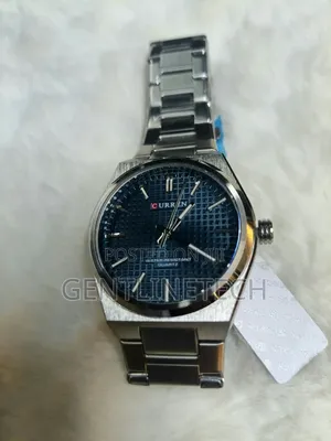 Curren 8439 Men's Silver and Blue Watch – KSh 3,500