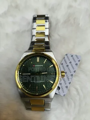 Curren 8439 Green and Gold Watch – KSh 3,000