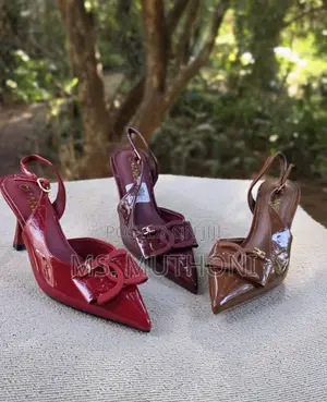 Chanel Patent Calfskin Slingback CC Bow Pumps