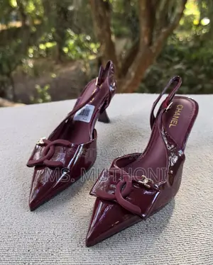 Chanel Patent Calfskin Slingback CC Bow Pumps