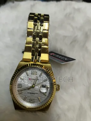 Curren 8498 Men's Gold and White Watch – KSh 3,000