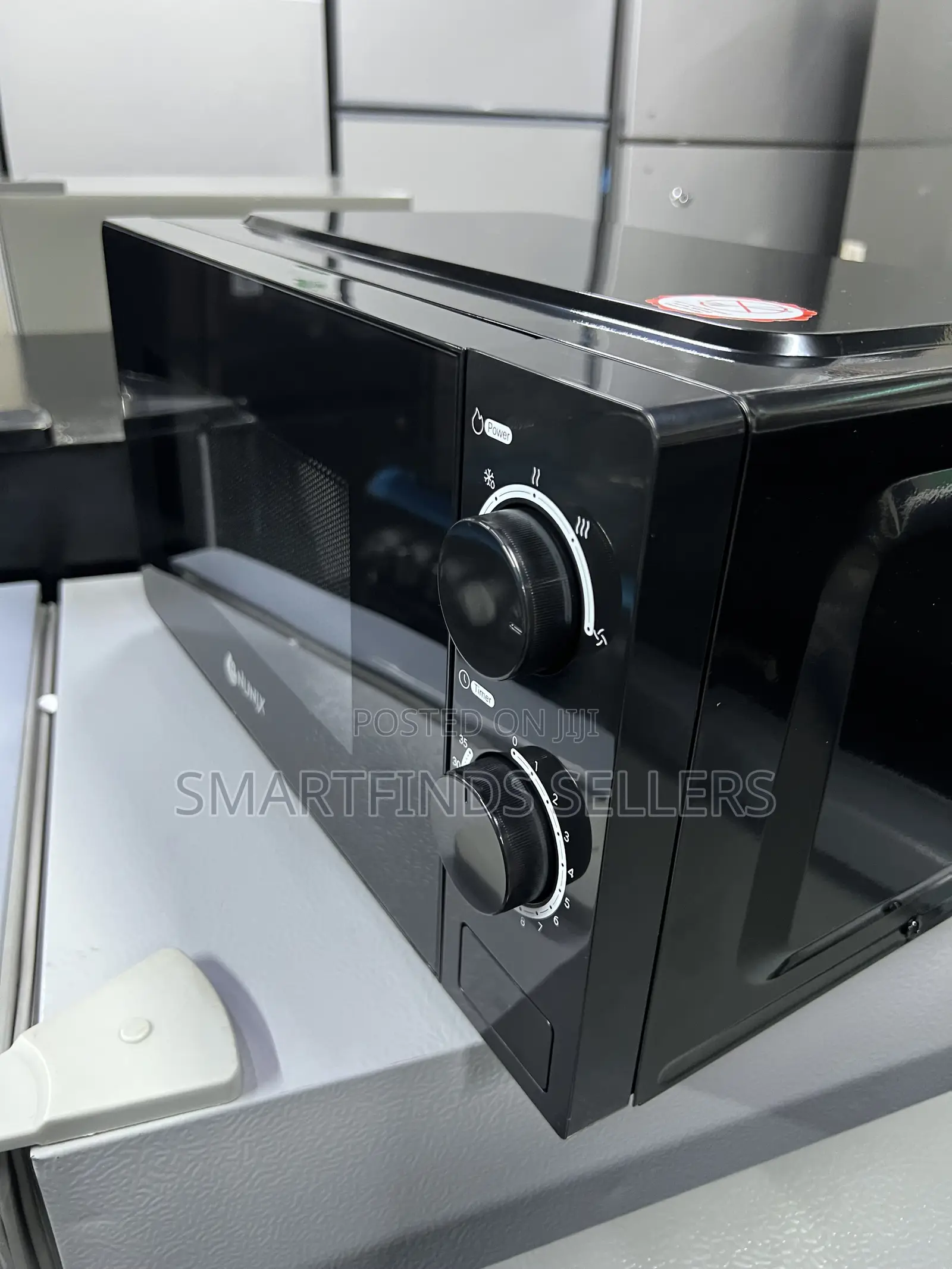 Nunix Manual Microwave Oven – Easy Heating at Your Fingertips! 
