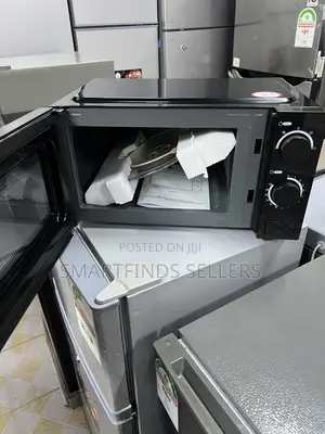 Nunix Manual Microwave – Affordable Quality for Your Kitchen! 