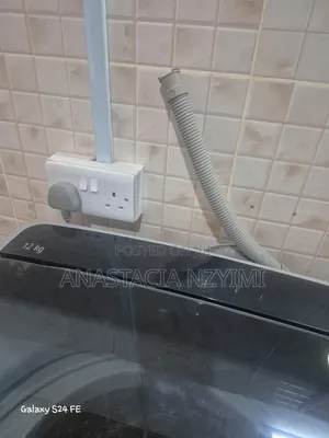 Washing Machine,Top Loader automatic.LG Model Slightly Used.