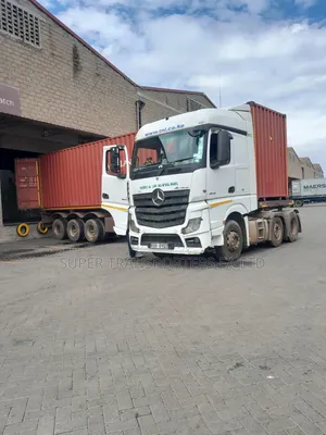 Delivering paint.Industrial Area- Nakasongola.Uganda.Barracks.