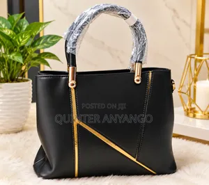 Elegant Black Ladies Handbag With Gold Details