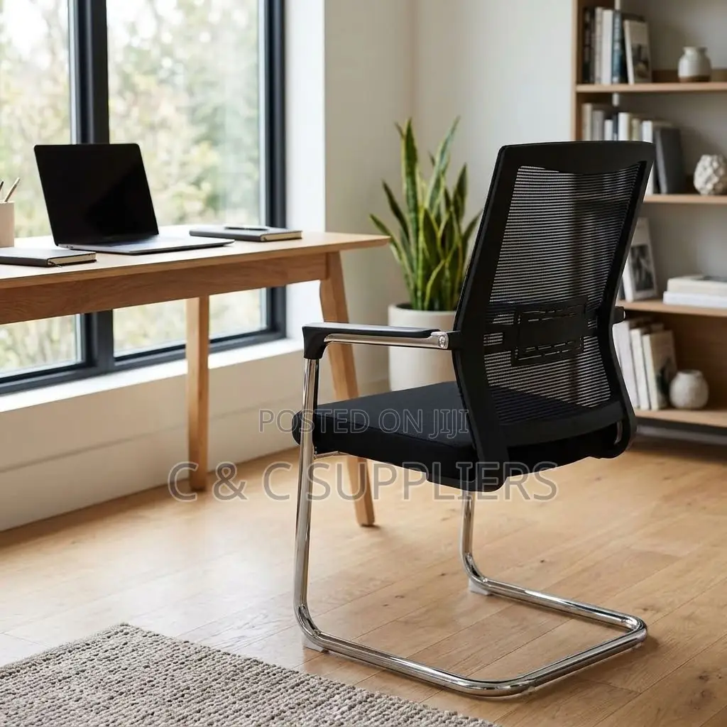 Mesh Visitors Chair With Padded Armrest.