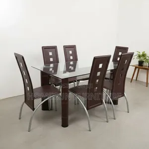 Dining Table – Glass Top With 6 Brown Chairs