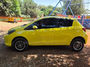 Toyota Vitz 2015 Yellow