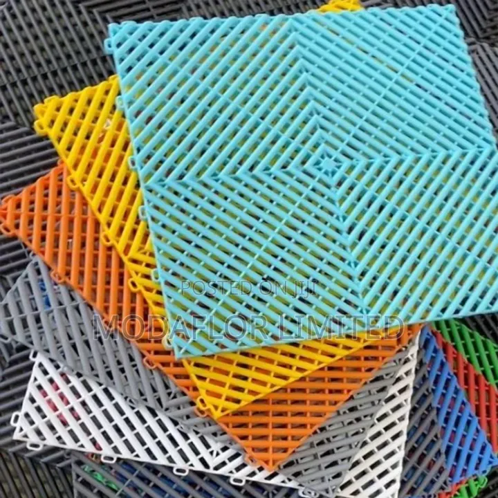 Garage Tiles for Workshops With Drainage Needs