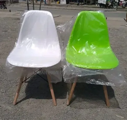 White/Green Eams Chairs
