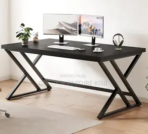 Black Computer Desk With Ergonomic Metallic Legs.