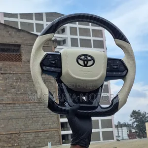 Biege Gr Universal Aftermarket Steering Wheel.