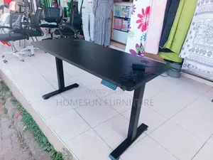 1.4m Electric Standing Desk With Black Top and Adjustable Height