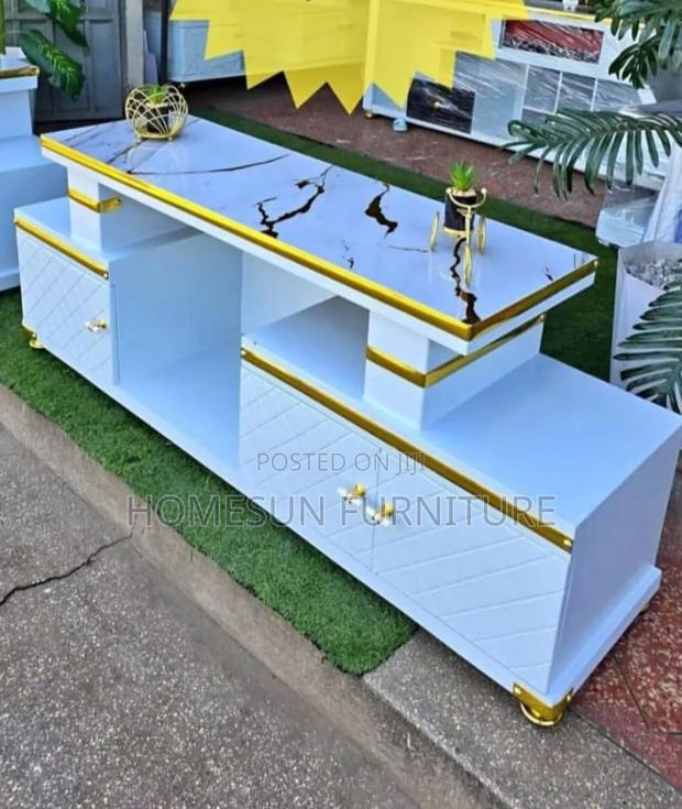 TV Stand With Marble Finish and Gold Accents