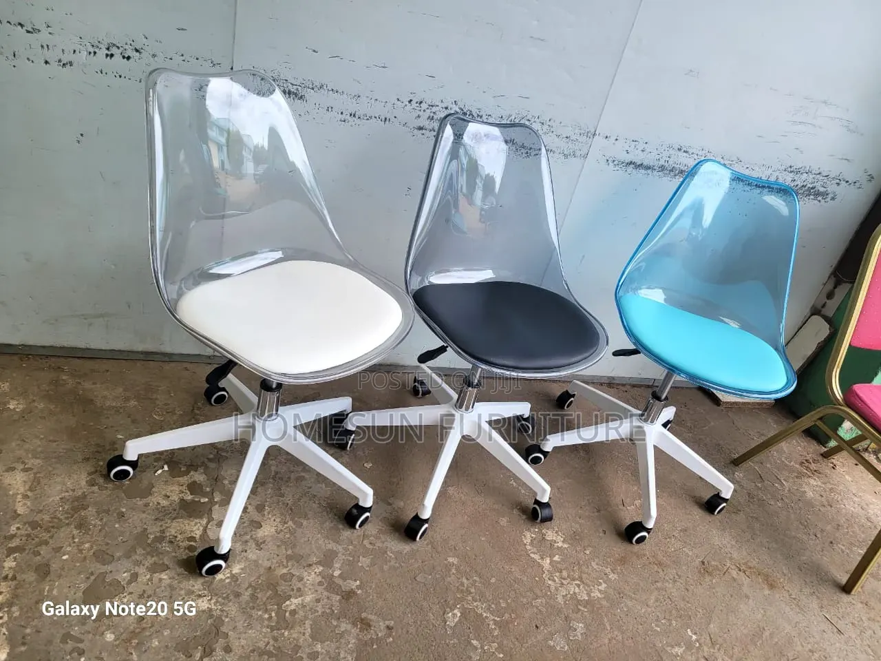 Swivel Chair With Transparent Back and Wheels