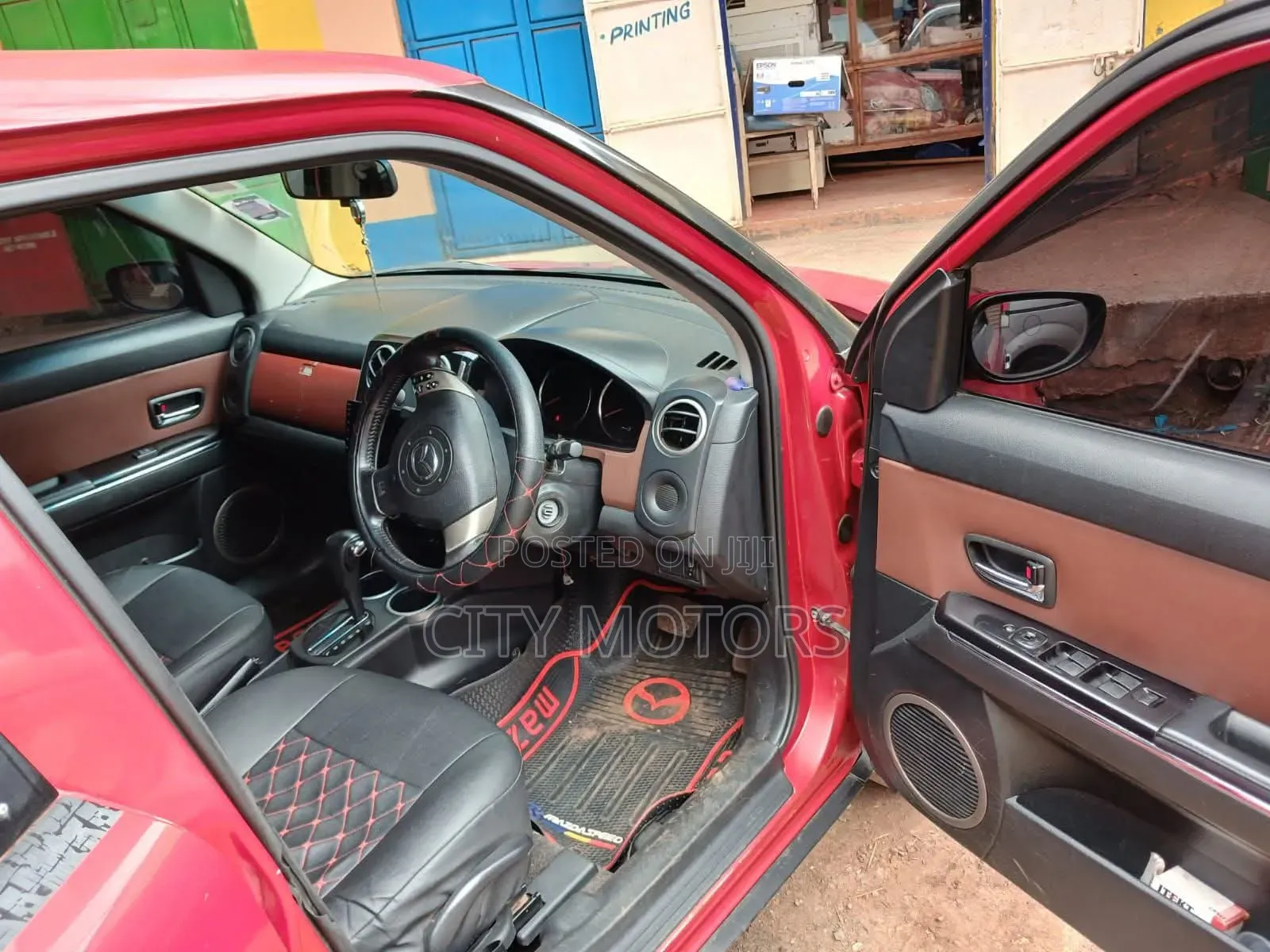 Mazda Verisa 2010 Red