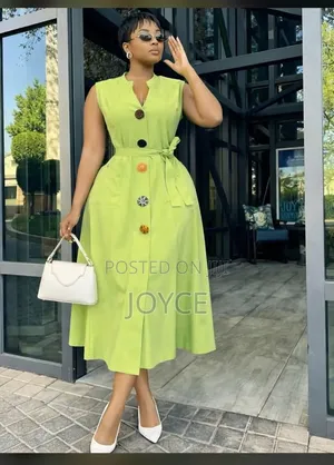 Plain Dress With Coloured Buttons