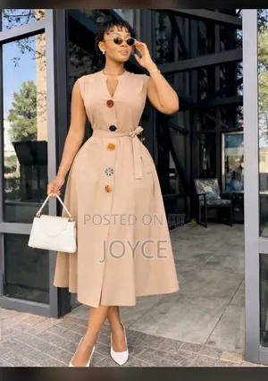Plain Dress With Coloured Buttons
