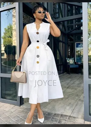 Plain Dress With Coloured Buttons