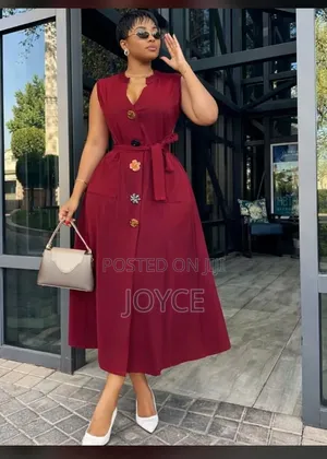 Plain Dress With Coloured Buttons
