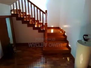 Kitchen Cabinets ,Stairs,wooden Floor and Waldrops