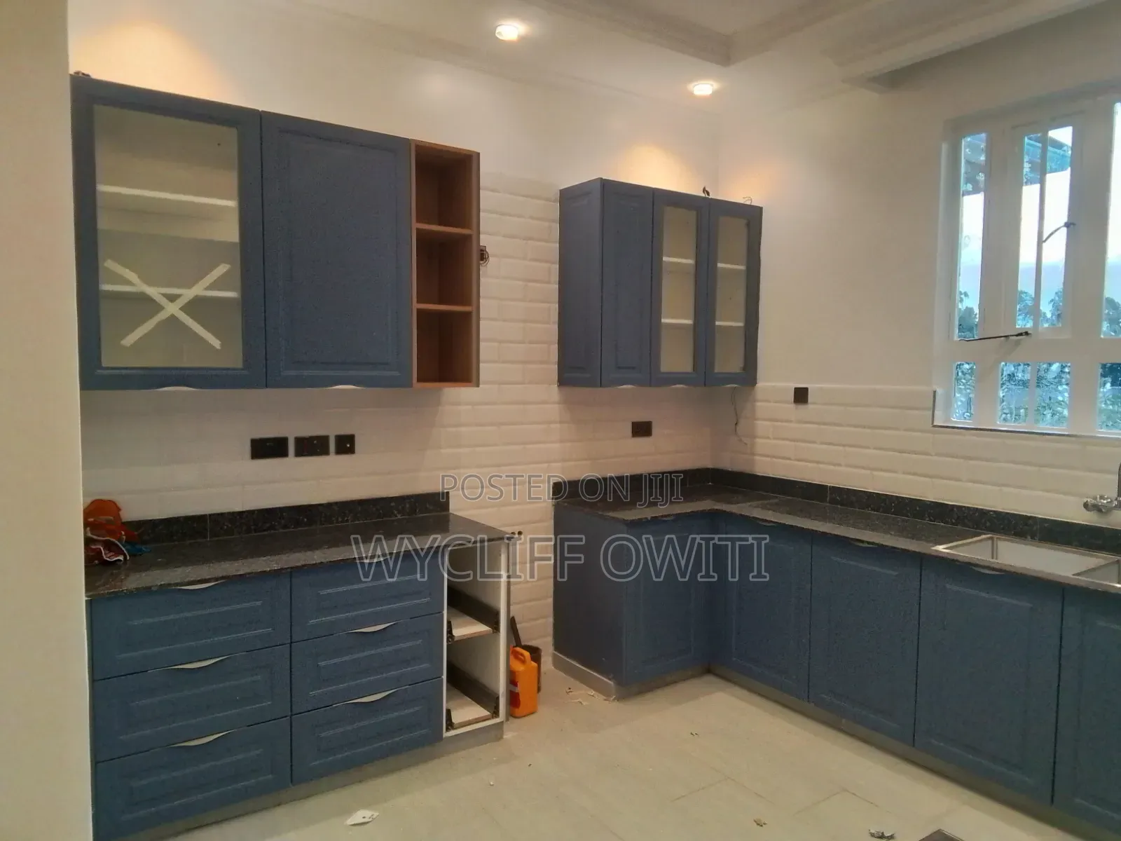 Kitchen Cabinets ,Stairs,wooden Floor and Waldrops