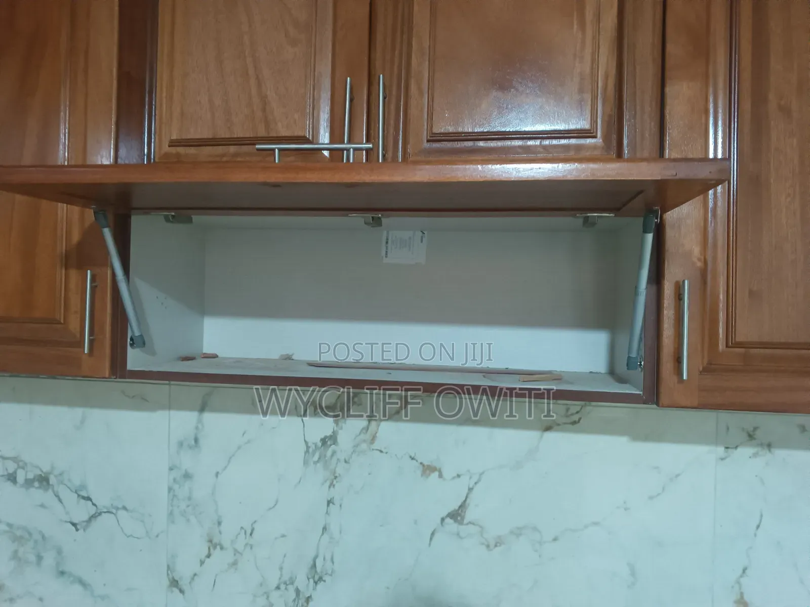 Kitchen Cabinets ,Stairs,wooden Floor and Waldrops