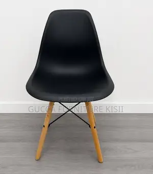 Black 4 Legged Plastic Low Back Eames Dining Chair