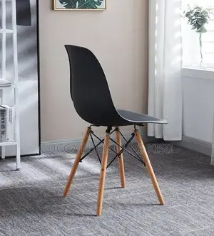 Black 4 Legged Plastic Low Back Eames Dining Chair